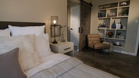 Move From Bed Detail to Closet Space Stock Footage 112898448