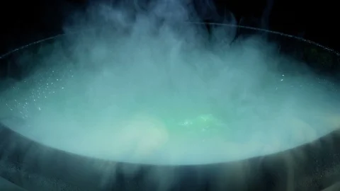 Move Up To Bubbling Magic Cauldron Stock Footage 121537299