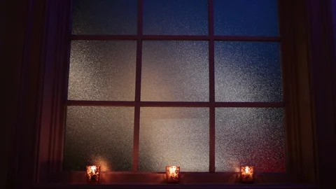 Move in on frosted window as lights shine through Stock Footage 96547657