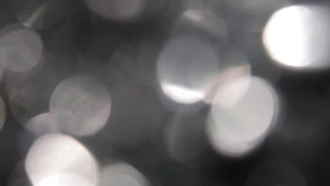 Move left to full screen bokeh light rays video from close up Stock Footage 317537018