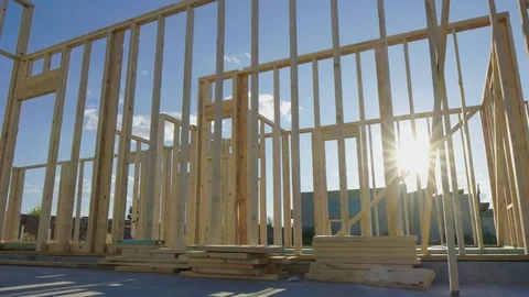 Move Left Through a Construction Site of a Framed Home Stock Footage 80833551