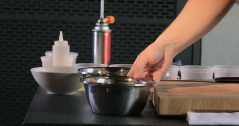 Move the plate with your hand. Chef in the kitchen moves professional dishes. Stock Footage 228677188