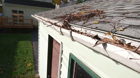 Move Right Over Clogged Gutters on Garage Stock Footage 68774583