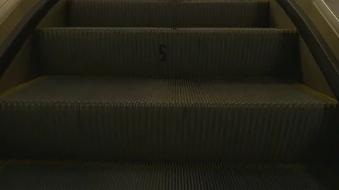 Move the steps up the escalator Stock Footage 73834690