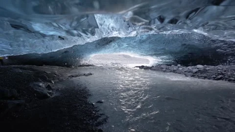 Move through glacier river in Ice Cave in Iceland Stock Footage 260599556