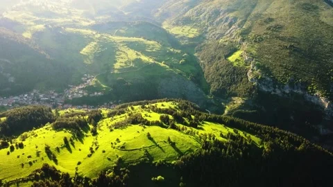 Move Through Hillside Area Revealing A Village Hidden in Fog Sunset Golden Hour Stock-Footage 289569687