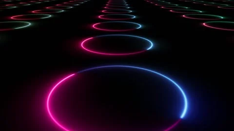 Move through neon circles rotating and glowing in pink and blue Stock Footage 139619760