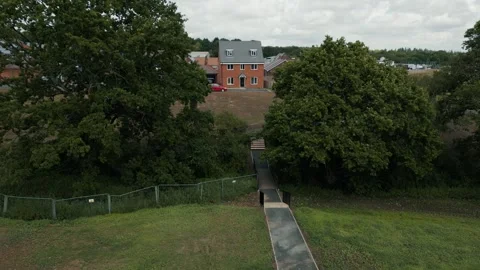 A move through two trees directly towards a new house Stock Footage 296801705