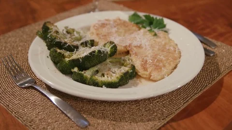 Move Toward Over Chicken and Broccoli Dish Place Setting Slow Motion Stock Footage 81276900