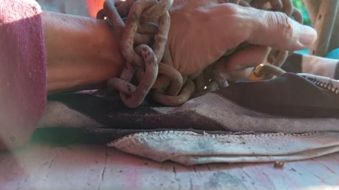 Move your hand away from the chain Stockbeeldmateriaal 262018695