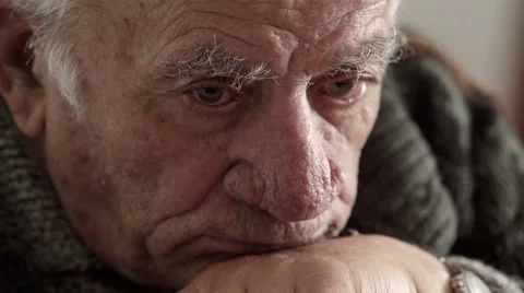 Moved and sad old man stares into space 스톡 동영상 63421262