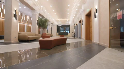 Movement along hotel corridor with sofas and columns Stock Footage 167915563