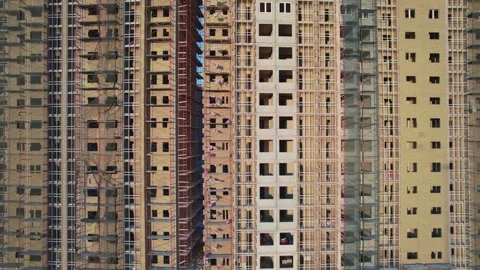 Movement along a house under construction at sunset unfinished house from a Stock Footage 243121574