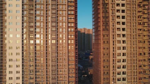 Movement along a house under construction at sunset unfinished house from a Stock Footage 243121639