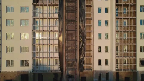 Movement along a house under construction at sunset unfinished house from a Stock Footage 243121739