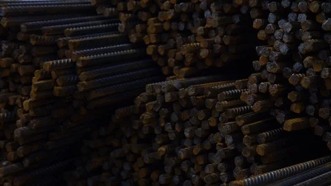 Movement along a large pile of thin metal fittings at a construction site close Stock Footage 117843460