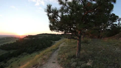 Movement along the path along the mountainside at evening Stock-Footage 52980177