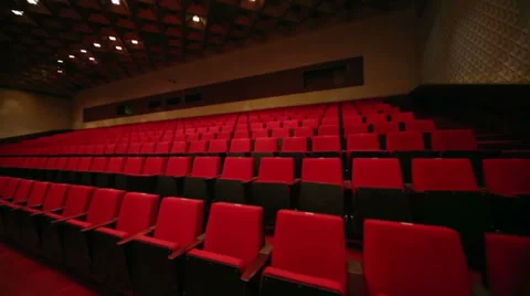 Movement along the rows of comfortable red chairs Stock Footage 37657003