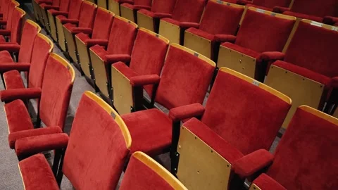 Movement Along the Rows of Red Seats in the Old Cinema Auditorium Stock Footage 255888878