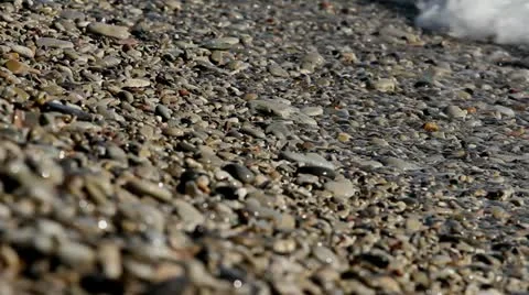 Movement along the stone beach Stock Footage 21761233