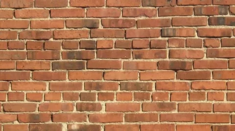 Movement along the wall of red brick Stock Footage 61478768