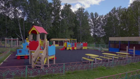 Movement around an empty playground in the forest Stock Footage 135282757