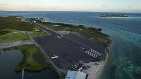 Movement back aerial view track los roques sunset ascent Stock Footage 296816999