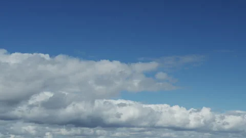 Movement of beautiful clouds in the blue sky, time lapse video. Stock Footage 251879144