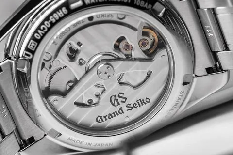 Movement is behins glass case of Automatic wrist watch Grand Seiko Stock Photos