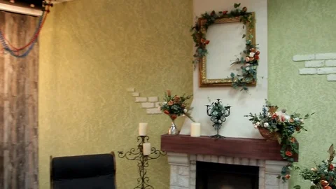 Movement of the camera along the wall, decorated with flowers and fruits Stock Footage 92331136