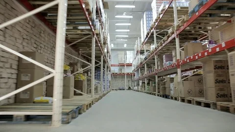 The movement of the camera between shelves with household chemicals in a large Stock Footage 92330756