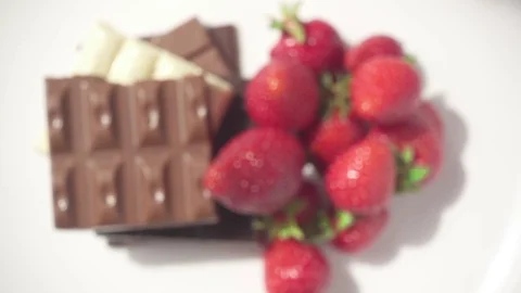 Movement of the camera on a strawberry and chocolate Video stock 90374376