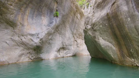 Movement on the canyon with wavy and smooth sandstone walls amazing rock Stock Footage 155006245