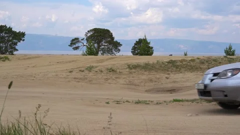 Movement of the car on a dirt road back view. Off road trip along dirt road Stock Footage 134920730