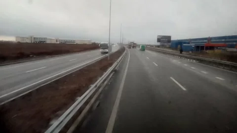 The movement of the car on the highway, the view through the glass. Stock Footage 169905814