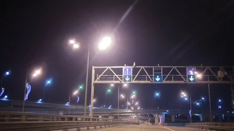 The movement of the car over the night auto interchange. Stock Footage 73211051