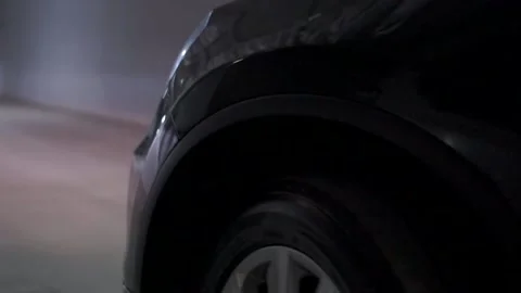 Movement of the car through the underground parking. rotary wheel Stock Footage 91829285