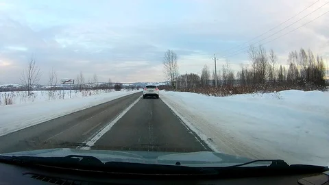 The movement of the car on the winter snow-covered road. Stock Footage 120602853
