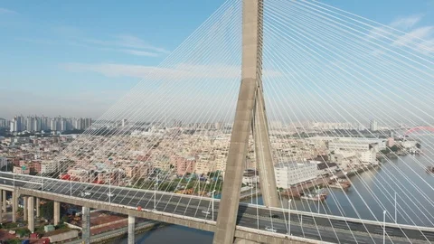 Movement of cars on a beautiful cable-stayed bridge. Guangzhou, China Stock Footage 113665267