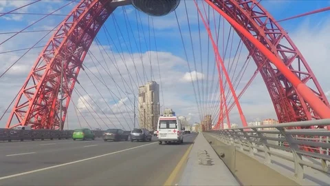Movement of cars through cable-stayed bridge in summer timelapse Stockbeeldmateriaal 79806997