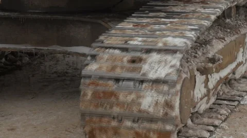 Movement of a caterpillar tractor, dirty snow Video stock 59732564