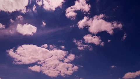 Movement of cirrus clouds in the blue sky Stock Footage 97716755