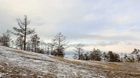 Movement of clouds above the forest on Olkhon Island, Lake Baikal,  Stock Footage 64932694