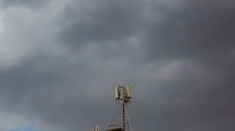 The movement of the clouds above telecommunication antenna. Stock Footage 66440181