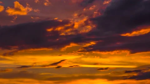 The movement of clouds across the red sky Stock Footage 151423868