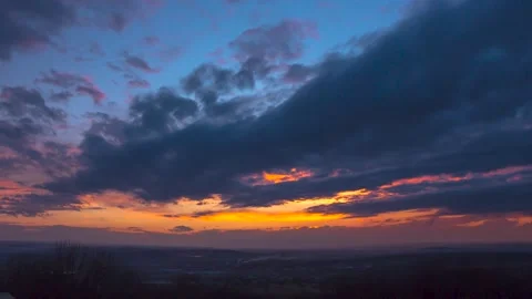 The movement of clouds across the red sky Stock Footage 151423900