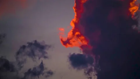 The movement of clouds across the red sky Stock Footage 151425452