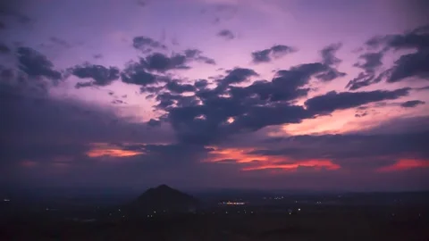 The movement of clouds across the red sky Stock Footage 151426741