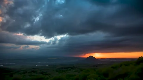 The movement of clouds across the red sky Stock Footage 151427016
