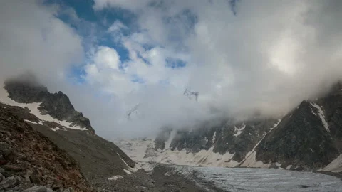 Movement of clouds and water flows in a stormy river in the mountains Video stock 87297300